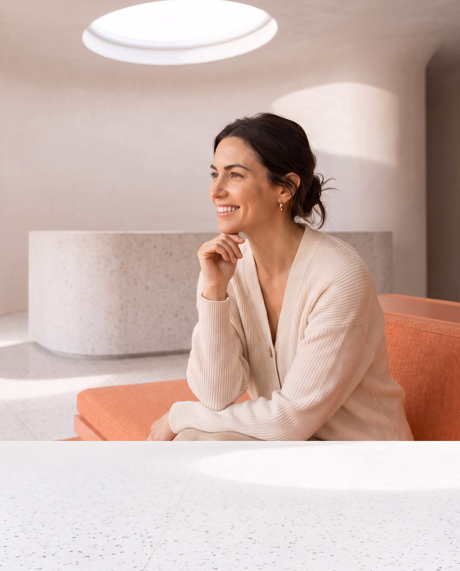 A patient waiting in the Smilery reception, smiling